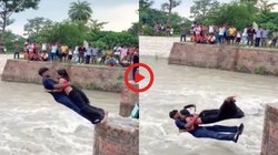एक दूसरे को बांहों में भरा और पानी की तेज धार में कूद गया कपल, दिल की धड़कनें बढ़ा रहा वीडियो वायरल, देखते रह गए लोग