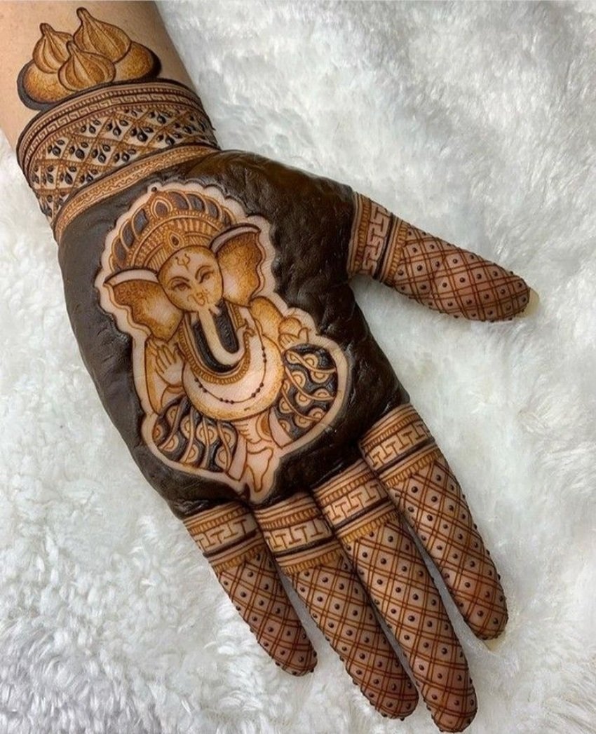 Enhance Festivities with Ganesha Mehndi Art