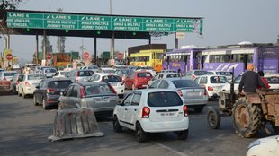 toll plaza traffic, highway congestion, toll collection issues