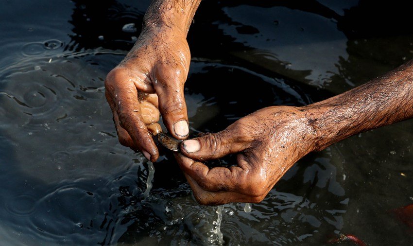 Why throwing money in river