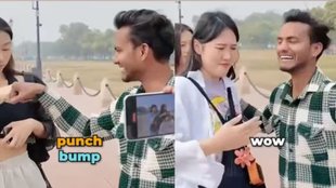 indian man harasses Korean women, indian man hugs korean woman