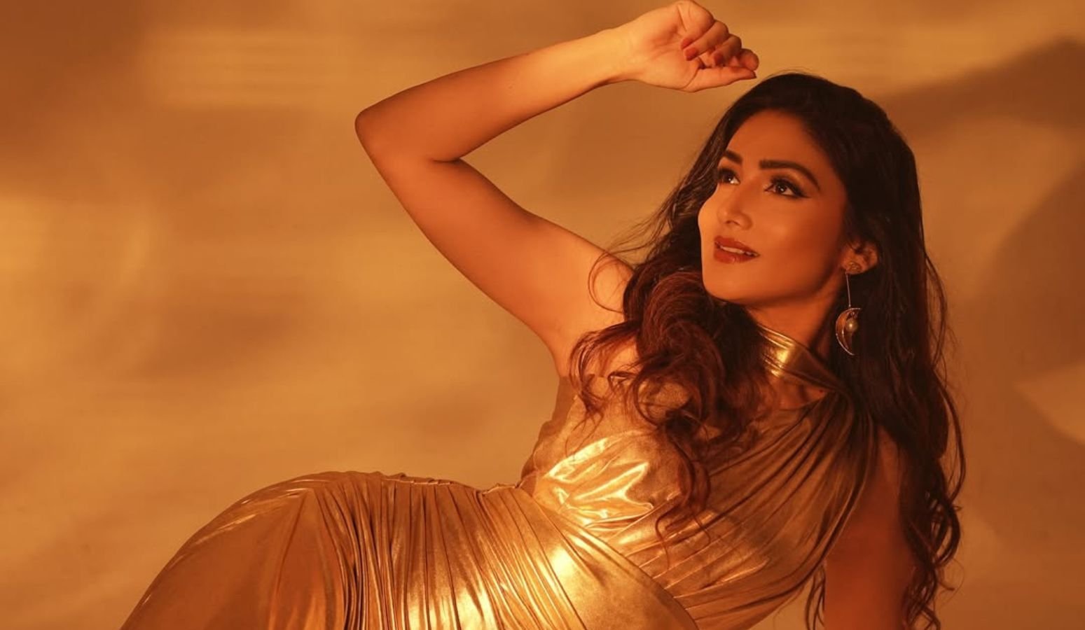 Tina Datta golden gown