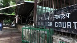 खुद को अमित शाह का भतीजा बताने वाले शख्स को हाई कोर्ट से झटका, 3.9 करोड़ रुपये ठगने का आरोप
