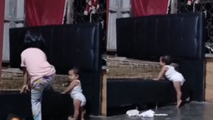 Elder sister teaching baby to climb bed viral video