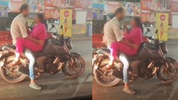 हद ही कर दी! सिग्नल पर रुकी थी गाड़ियां, तभी बाइक सवार कपल ने की ऐसी हरकत, Viral Video देख शर्म से झुक जाएंगी नजरें