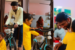 father, mother, son, cycle, viral video, gift