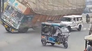 Rampur Road Accident Caught on Video Truck Carrying Straw Topples on Bolero One Dead