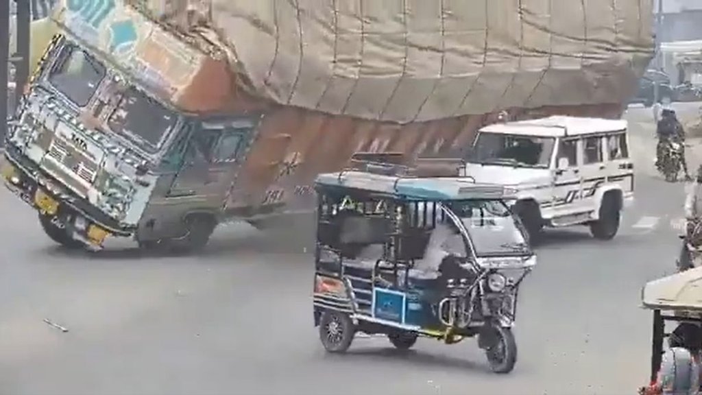 Rampur Road Accident Caught on Video Truck Carrying Straw Topples on Bolero One Dead