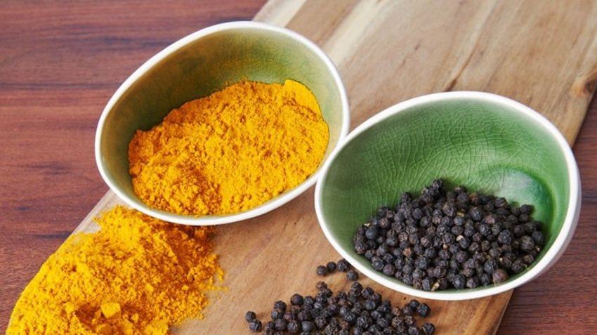Turmeric and Pepper in bowls.