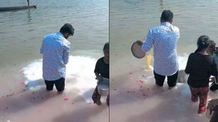 Man Offers Litres of Milk to Ganga Ignores Poor Children Nearby Viral Video Sparks Outrage Online