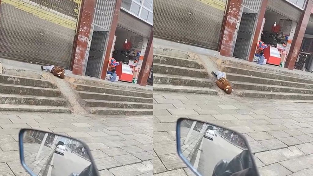 Child sliding on slope while lying on his back in viral video Child sliding on slope while lying on his back in viral video
