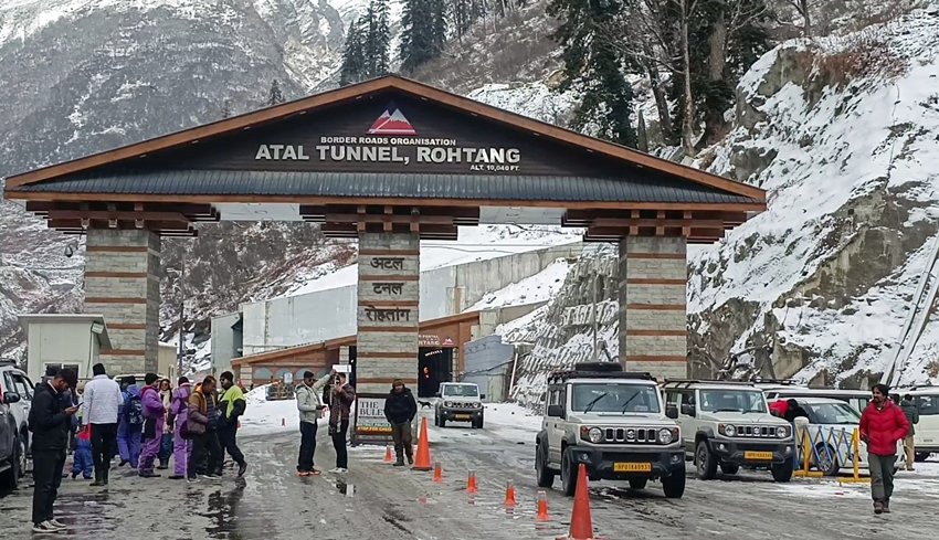 tourists enjoy snowfall