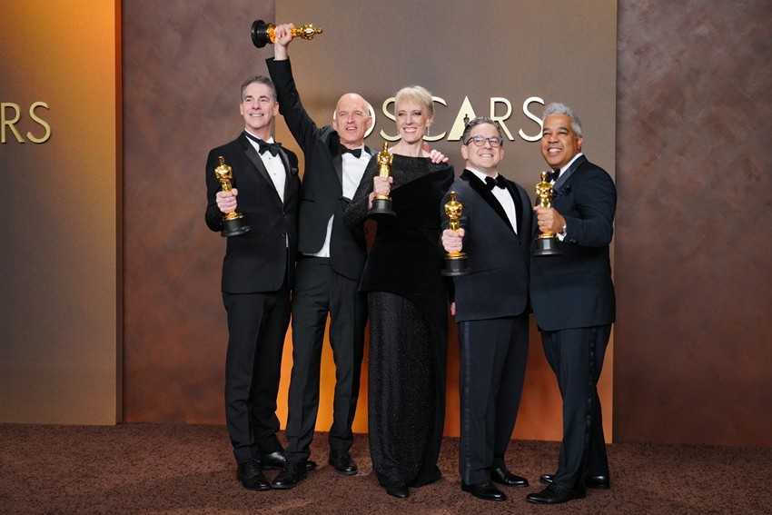 Al Nelson, from left, Gareth John, Gwendolyn Yates Whittle, Gary A. Rizzo, and Juan Peralta, winners of the award for sound 