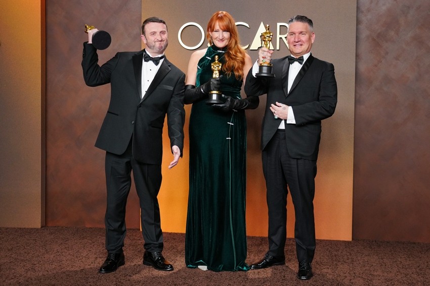 Mike Hill, from left, Cliona Furey, and Jordan Samuel, winners of the award for makeup and hairstyling
