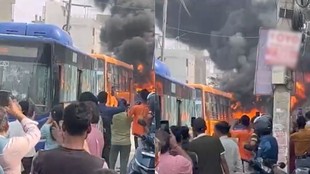 Delhi Youth crushed by DTC bus in Nangloi angry mob sets vehicle on fire after spot death