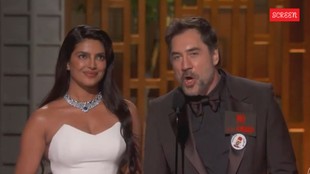 Priyanka Chopra and Javier Bardem on Oscars stage