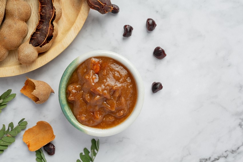 fresh sweet ripe tamarind on white background