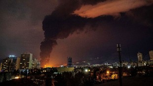 Black toxic rain Tehran, Toxic rain Tehran airstrikes, Tehran oil refinery airstrike, Israel strikes Iran oil facilities, Black rain in iran oil refinery attack