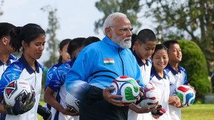 PM Narendra plays football with youths of Gangtok during two days visit to north eastern State Sikkim