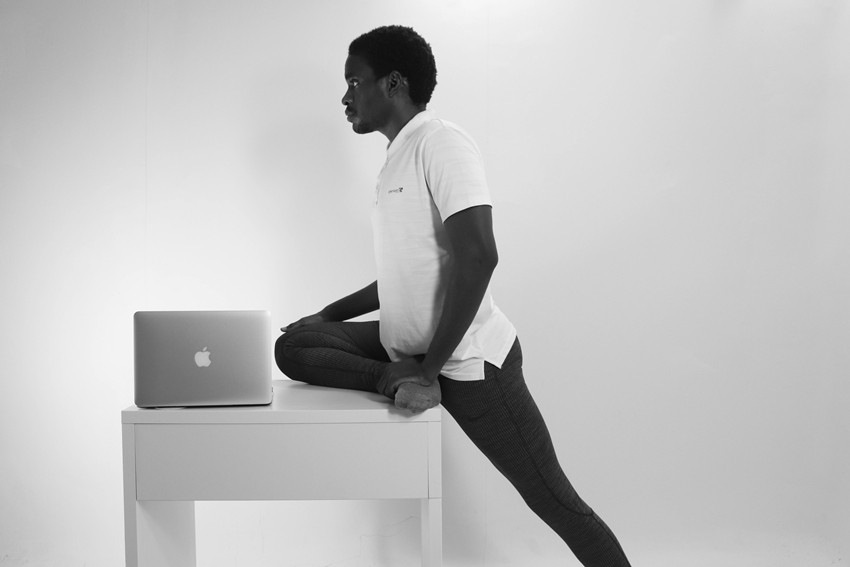 desk exercises like stretches or yoga poses