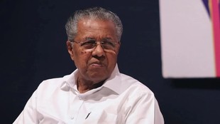 Kerala Chief Minister Pinarayi Vijayan, IAS B ashok