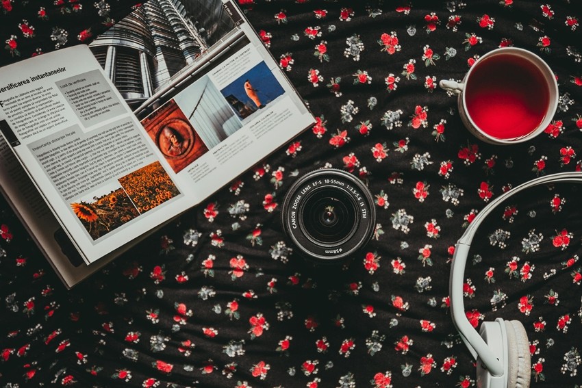 noise-cancelling headphones, a great book, herbal tea