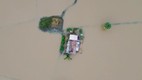 China flood rescue, Guangxi floods, man swims to rescue parents