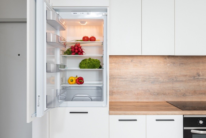 How much space behind fridge