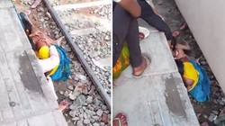 ट्रेन आती देख बच्चों को बचाने के लिए उनके ऊपर लेट गई मां, चिल्लाते रहे लोग; CCTV आया सामने