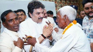 Kuldeep Bishnoi news, Kuldeep Bishnoi Sneh Milan, Kuldeep Bishnoi latest news, Kuldeep Bishnoi political career, Kuldeep Bishnoi Sneh Milan Haryana, Kuldeep Bishnoi bjp flags, Kuldeep Bishnoi Bhajan Lal family